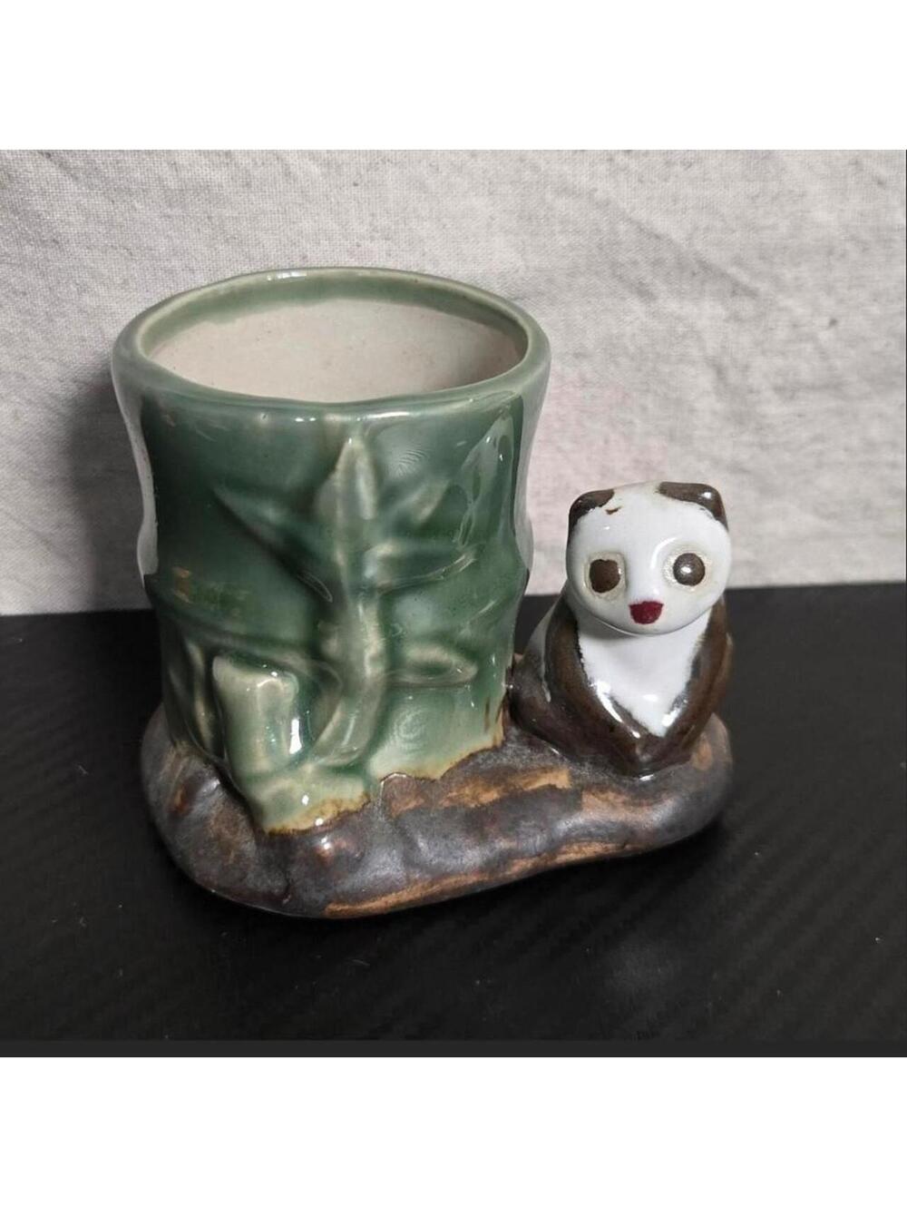 Cute vintage bamboo pot with panda bear